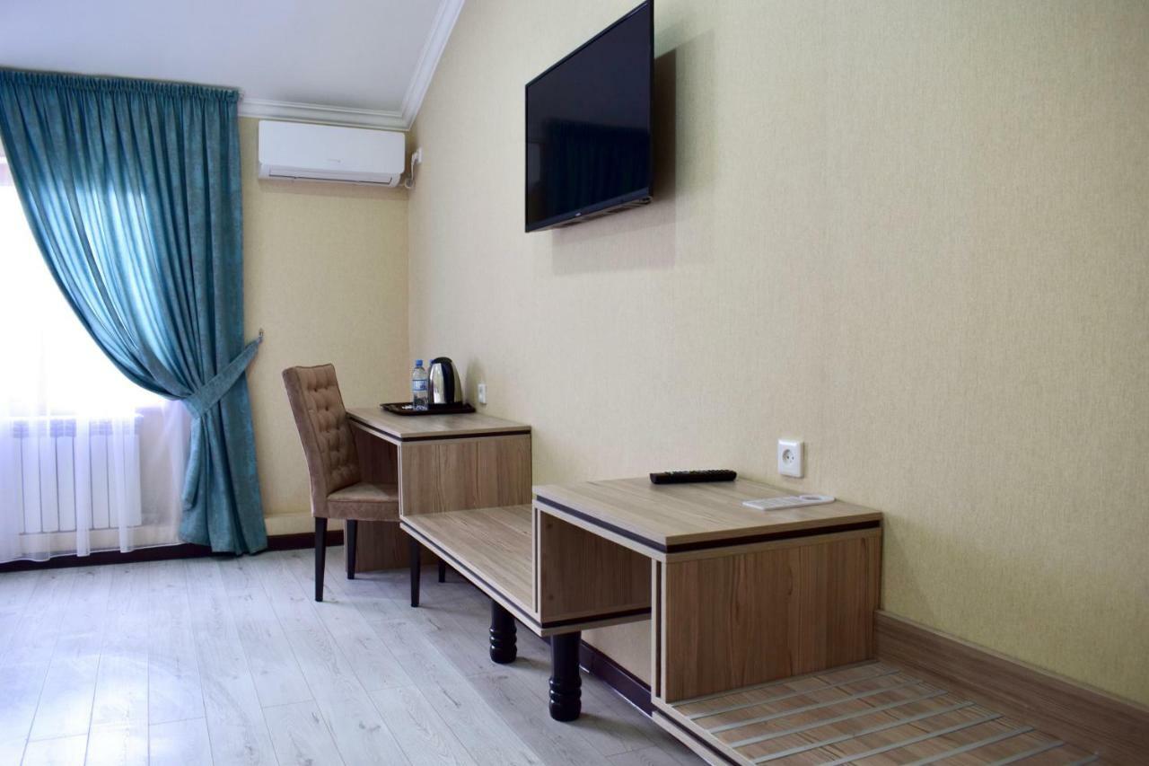 Dostar Inn Шимкент Екстер'єр фото