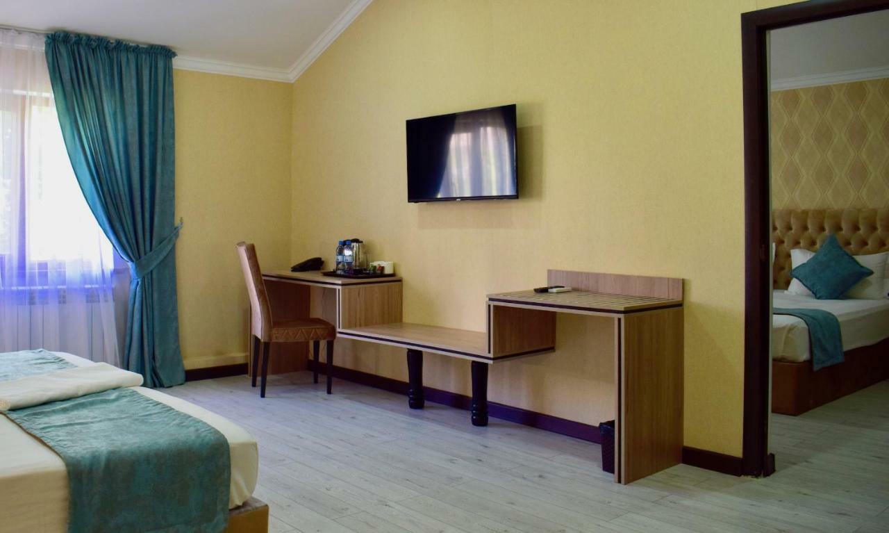 Dostar Inn Шимкент Екстер'єр фото