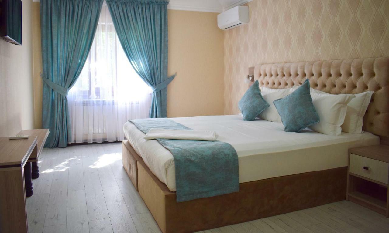 Dostar Inn Шимкент Екстер'єр фото